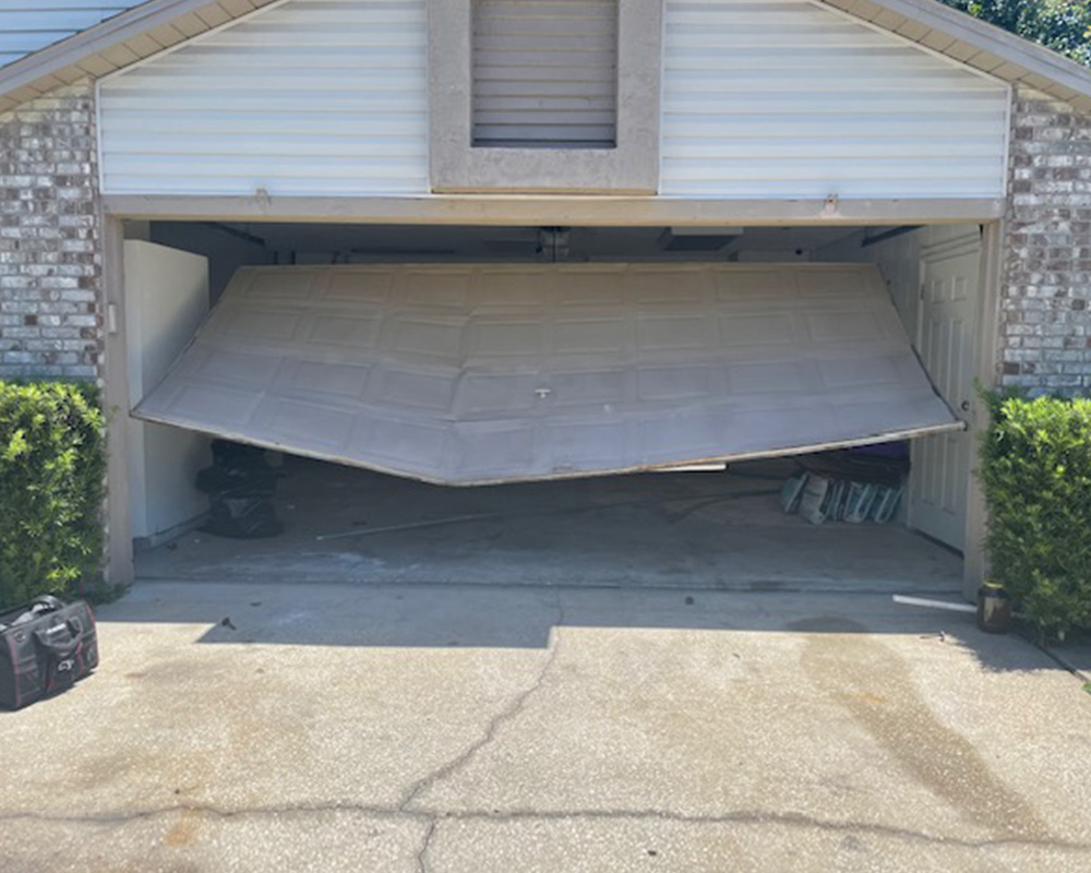 Damaged Residential Garage Door